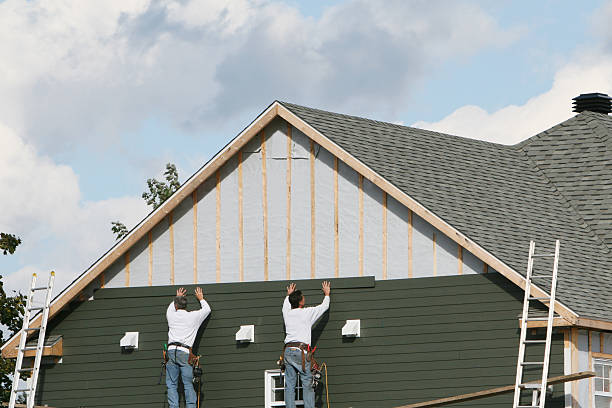 Professional Siding technician working in Charlottesville, VA